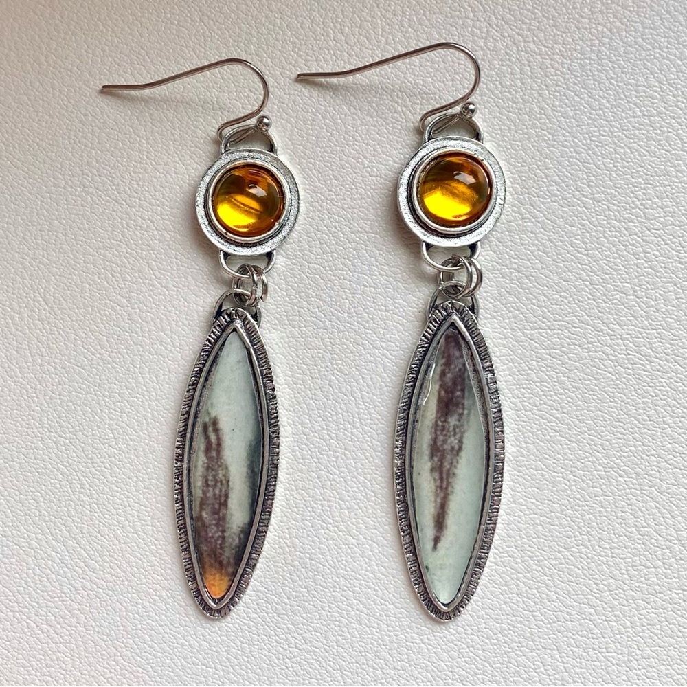Silver and amber earrings with a boho vibe